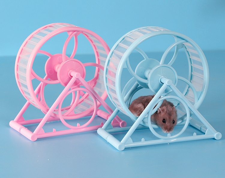 pink and blue plastic hamster wheel toys 